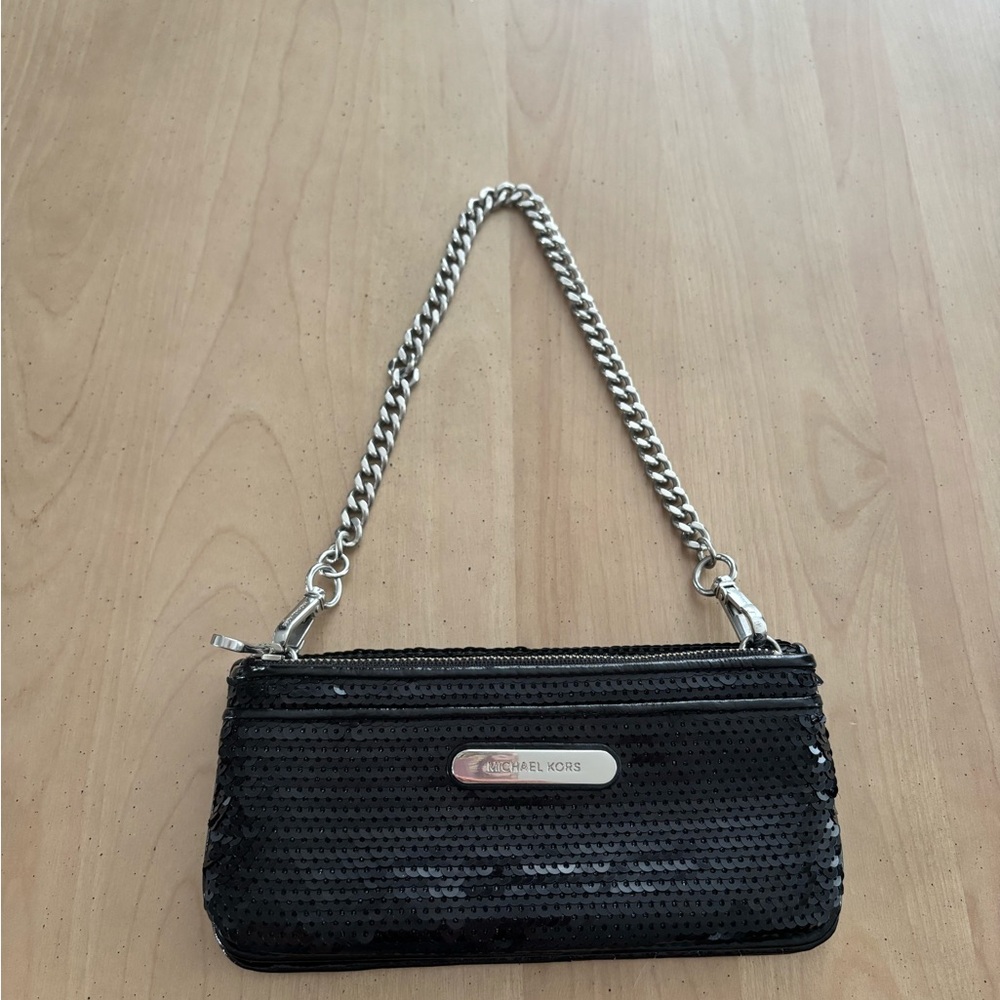 MICHAEL KORS Wristlet. Black With Silver Chain Strap And Accents. Pre-owned.